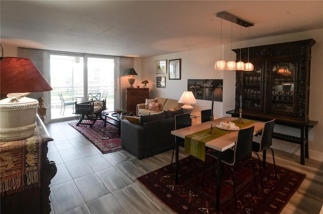401 SE 3rd St Unit 403, Dania Beach, FL 33004 - tiled living area featuring a wall of windows