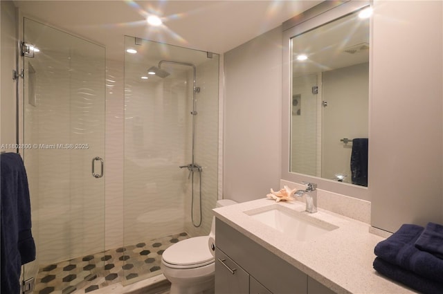 401 SE 3rd St Unit 403, Dania Beach, FL 33004 - full bathroom featuring toilet, a shower stall, and vanity