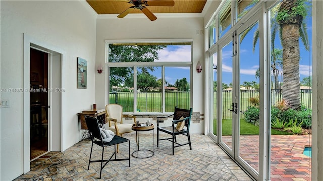 2495 Eagle Watch Ln, Weston, FL 33327 - sunroom featuring brick flooring, crown molding, healthy amount of natural light, french doors, and wooden ceiling