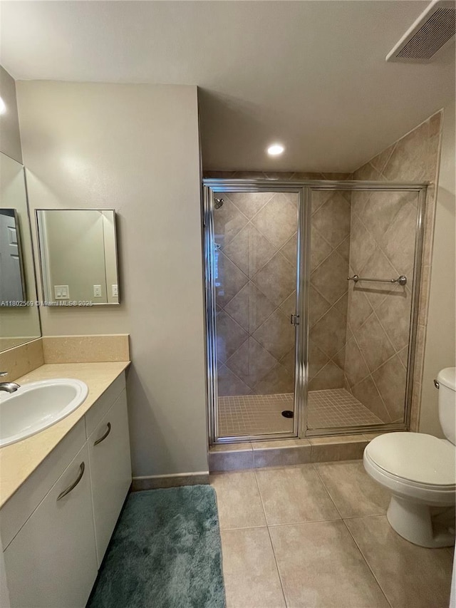 2080 S Ocean Dr Unit Ph4, Hallandale Beach, FL 33009 - bathroom featuring toilet, vanity, a stall shower, tile patterned floors, and recessed lighting