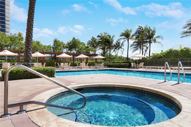 2080 S Ocean Dr Unit Ph4, Hallandale Beach, FL 33009 - community pool with a community hot tub, fence, and a patio