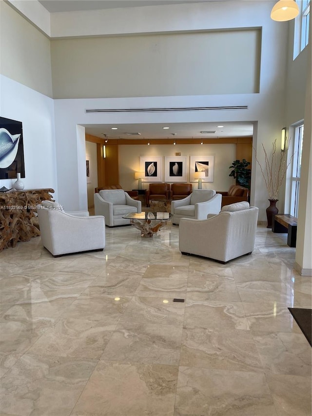 2080 S Ocean Dr Unit Ph4, Hallandale Beach, FL 33009 - living area with a high ceiling and marble tiled floors