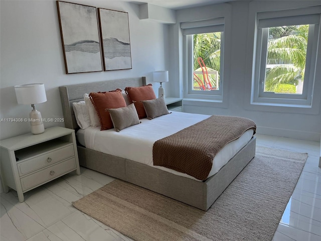 2301 Collins Ave Unit 326, Miami Beach, FL 33139 - bedroom with light marble finish floors