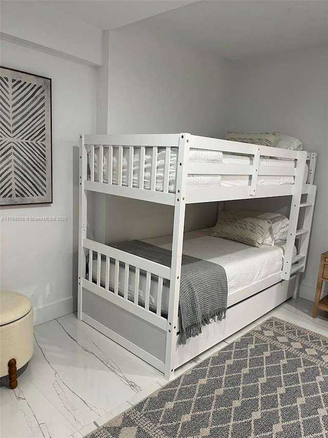 2301 Collins Ave Unit 326, Miami Beach, FL 33139 - bedroom with marble finish flooring and baseboards