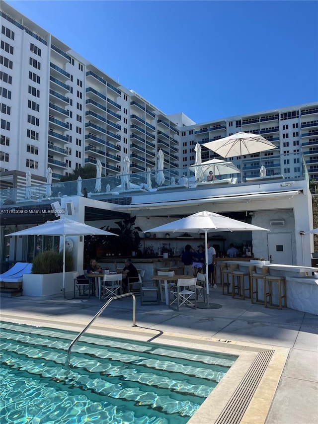 2301 Collins Ave Unit 326, Miami Beach, FL 33139 - view of pool featuring a patio area