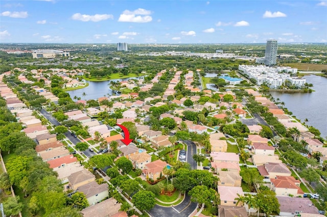 2238 NW 139th Ave, Sunrise, FL 33323 - aerial view of property and surrounding area featuring a nearby body of water and nearby suburban area