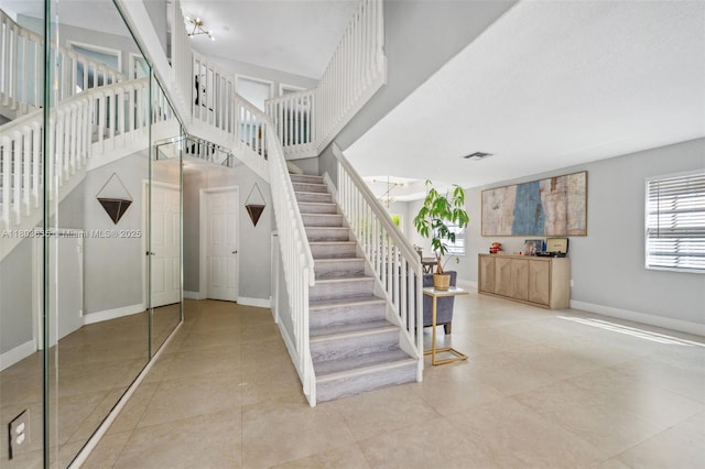 2238 NW 139th Ave, Sunrise, FL 33323 - stairway featuring baseboards and tile patterned flooring
