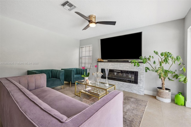 2238 NW 139th Ave, Sunrise, FL 33323 - living area featuring a ceiling fan, a brick fireplace, and baseboards