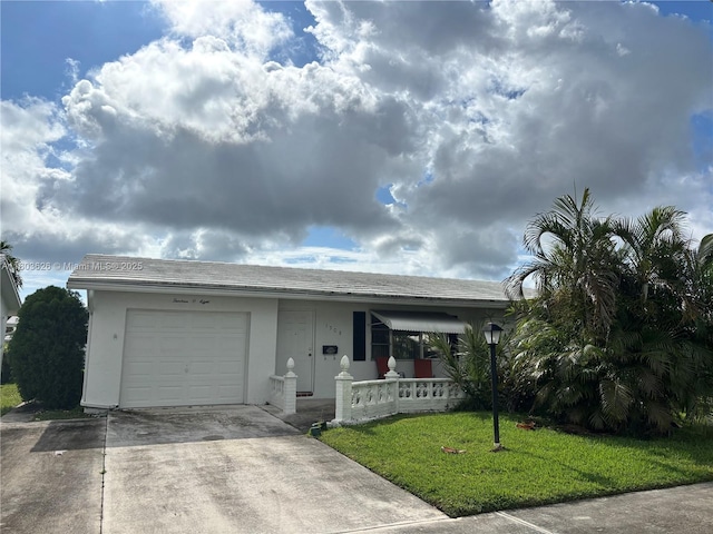 single story home featuring a porch, a garage, stucco siding, driveway, and a front lawn