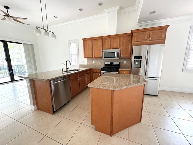 12490 NW 33rd St, Sunrise, FL 33323 - kitchen featuring appliances with stainless steel finishes, a sink, french doors, a ceiling fan, and light tile patterned floors