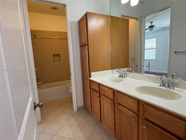 12490 NW 33rd St, Sunrise, FL 33323 - full bath featuring tile patterned floors, double vanity, a ceiling fan, toilet, and shower / washtub combination