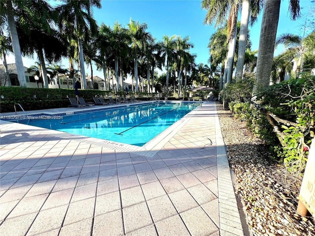 12490 NW 33rd St, Sunrise, FL 33323 - community pool with a patio