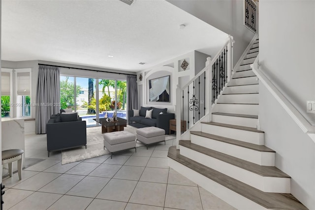 12339 NW 25th St, Coral Springs, FL 33065 - staircase featuring tile patterned floors