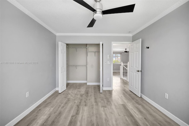 12339 NW 25th St, Coral Springs, FL 33065 - unfurnished bedroom featuring light wood-type flooring, a closet, ornamental molding, and baseboards