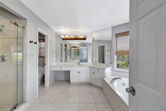 12339 NW 25th St, Coral Springs, FL 33065 - bathroom featuring a stall shower, tile patterned floors, toilet, vanity, and a bath
