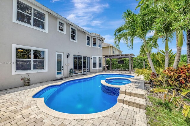 12339 NW 25th St, Coral Springs, FL 33065 - view of pool with a pergola, a patio, and a pool with connected hot tub