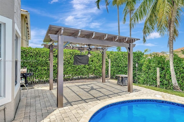 12339 NW 25th St, Coral Springs, FL 33065 - view of swimming pool featuring a pergola and a patio area