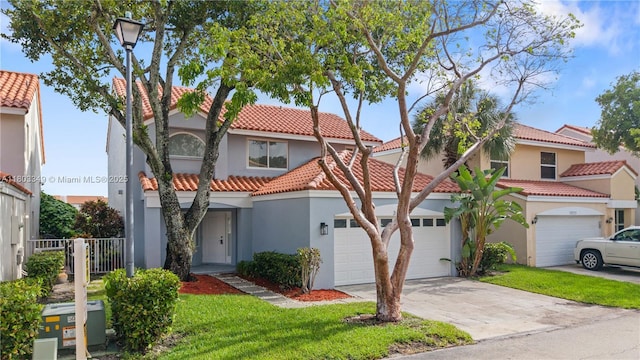 3835 Lombardy St, Hollywood, FL 33021 - mediterranean / spanish house with stucco siding, a tiled roof, and driveway