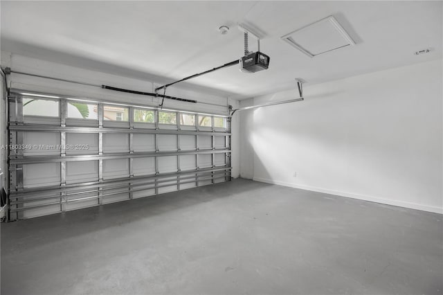 3835 Lombardy St, Hollywood, FL 33021 - garage with a garage door opener and baseboards
