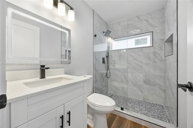3835 Lombardy St, Hollywood, FL 33021 - bathroom with a walk in shower, toilet, vanity, and wood finished floors