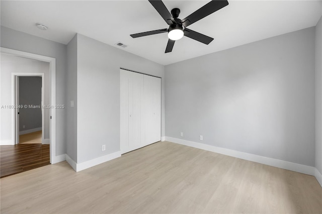3835 Lombardy St, Hollywood, FL 33021 - unfurnished bedroom featuring light wood finished floors, baseboards, a closet, and a ceiling fan