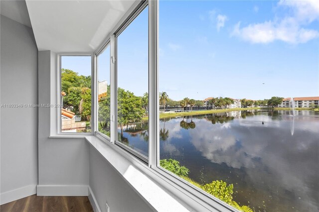 3835 Lombardy St, Hollywood, FL 33021 - unfurnished sunroom featuring a water view