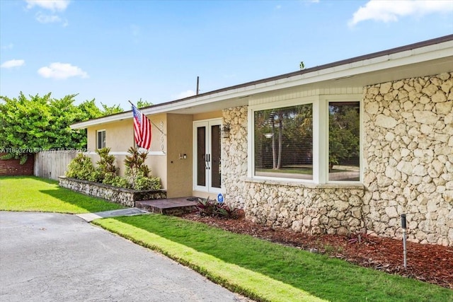 9750 SW 143rd Dr, Miami, FL 33176 - single story home featuring stone siding