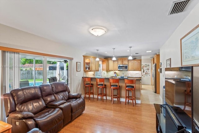 9750 SW 143rd Dr, Miami, FL 33176 - living room with light wood-style flooring
