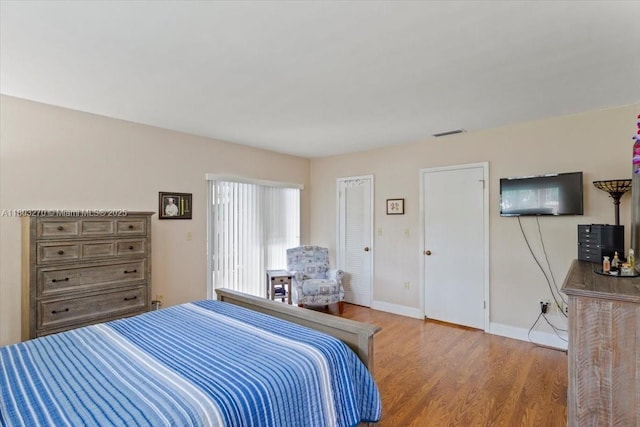 9750 SW 143rd Dr, Miami, FL 33176 - bedroom featuring wood finished floors and baseboards