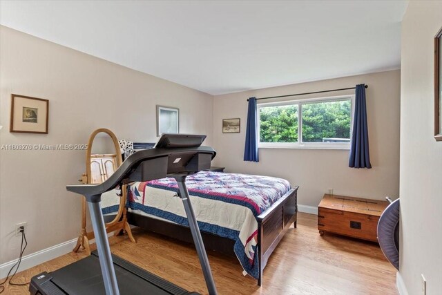 9750 SW 143rd Dr, Miami, FL 33176 - bedroom featuring wood finished floors and baseboards