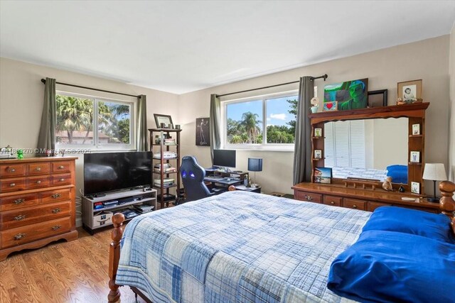 9750 SW 143rd Dr, Miami, FL 33176 - bedroom with multiple windows and wood finished floors