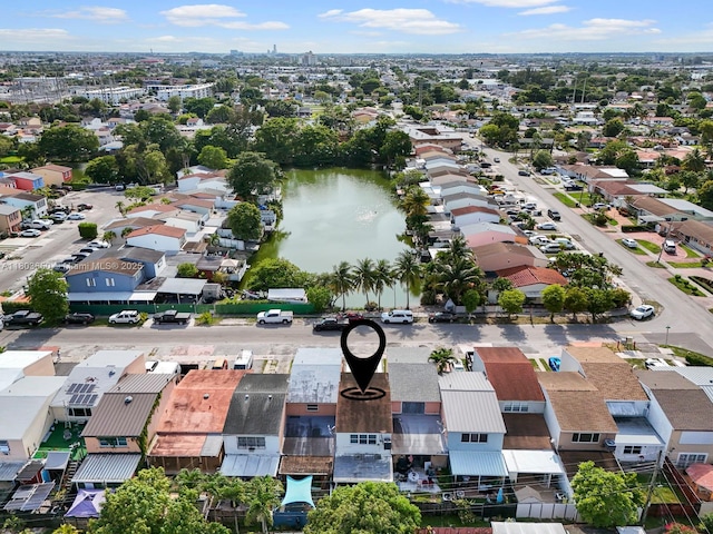 7165 W 13th Ave, Hialeah, FL 33014 - aerial perspective of suburban area with a nearby body of water
