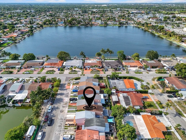 7165 W 13th Ave, Hialeah, FL 33014 - aerial view of residential area with a nearby body of water