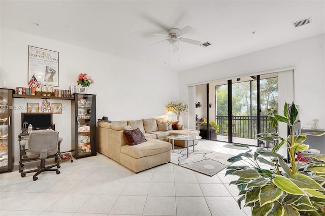 2901 NW 126th Ave Unit 2-415, Sunrise, FL 33323 - living room with a ceiling fan and light tile patterned floors