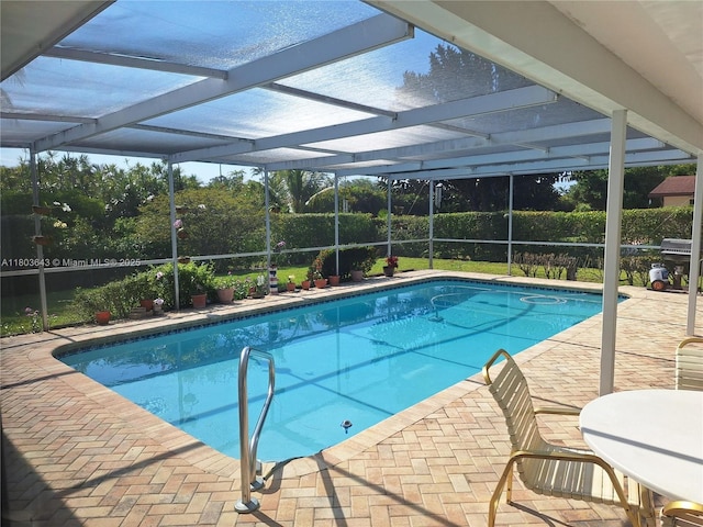 1101 SW 75th Ter, Plantation, FL 33317 - view of swimming pool featuring a patio area, grilling area, and a lanai