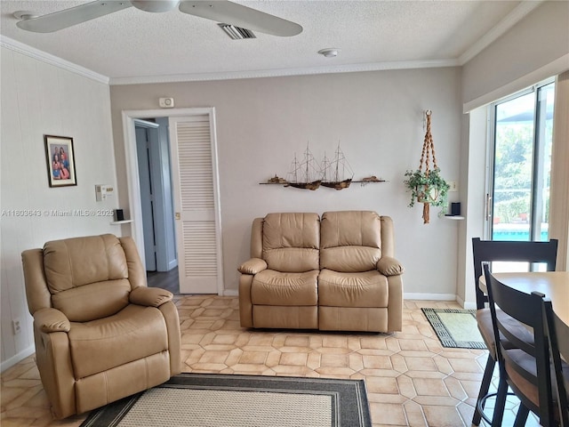 1101 SW 75th Ter, Plantation, FL 33317 - living room with a ceiling fan, crown molding, and a textured ceiling