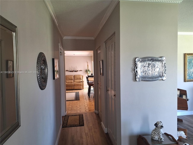 1101 SW 75th Ter, Plantation, FL 33317 - hallway with crown molding, a textured ceiling, dark wood-type flooring, and baseboards