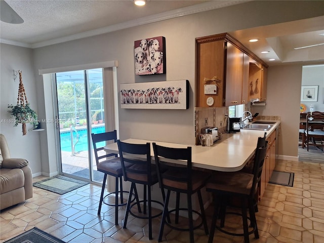 1101 SW 75th Ter, Plantation, FL 33317 - dining area with crown molding, recessed lighting, light tile patterned floors, and baseboards
