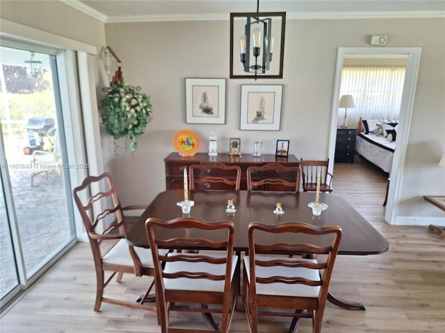 1101 SW 75th Ter, Plantation, FL 33317 - dining area with ornamental molding, a chandelier, and light wood finished floors