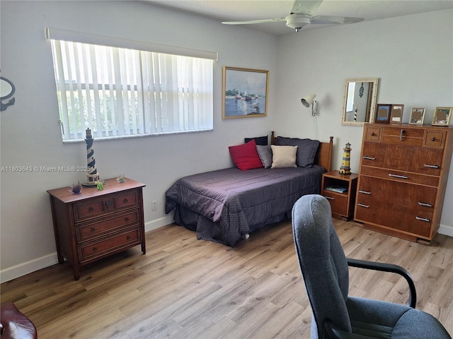 1101 SW 75th Ter, Plantation, FL 33317 - bedroom with light wood finished floors, baseboards, and a ceiling fan