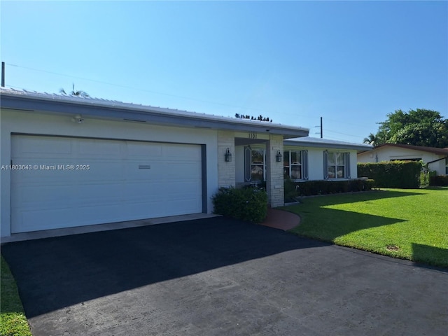 1101 SW 75th Ter, Plantation, FL 33317 - ranch-style house with a front yard, driveway, a garage, and a metal roof