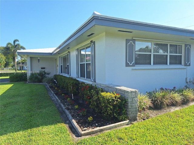 1101 SW 75th Ter, Plantation, FL 33317 - view of side of home featuring stucco siding and a lawn
