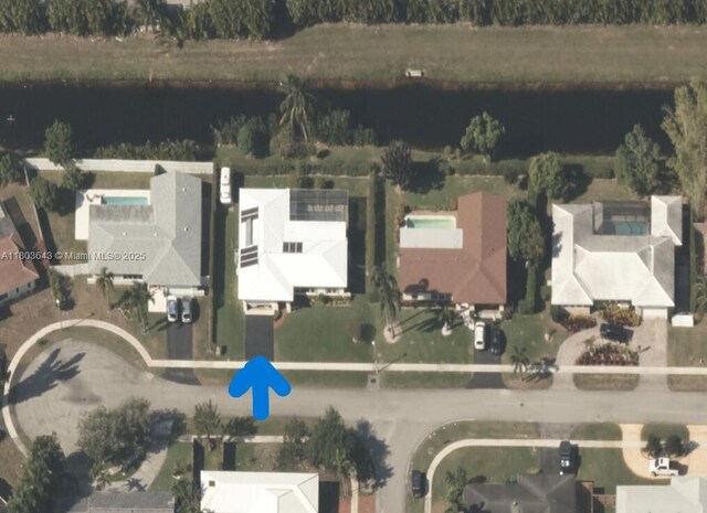 1101 SW 75th Ter, Plantation, FL 33317 - aerial overview of property's location with a nearby body of water and nearby suburban area