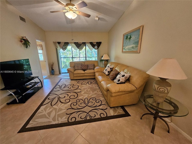 1301 Sabal Ridge Cir Unit G, Palm Beach Gardens, FL 33418 - tiled living area featuring vaulted ceiling and ceiling fan