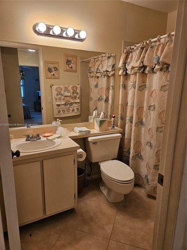 1301 Sabal Ridge Cir Unit G, Palm Beach Gardens, FL 33418 - full bathroom featuring tile patterned floors, toilet, vanity, and ensuite bath