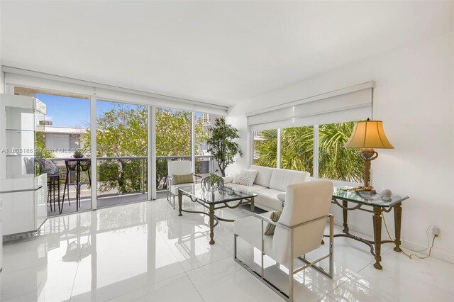 1 Harbour Way Unit 305, Bal Harbour, FL 33154 - tiled living room with baseboards