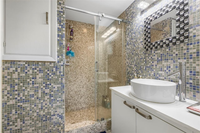 1 Harbour Way Unit 305, Bal Harbour, FL 33154 - full bath with a shower stall, vanity, and tile walls