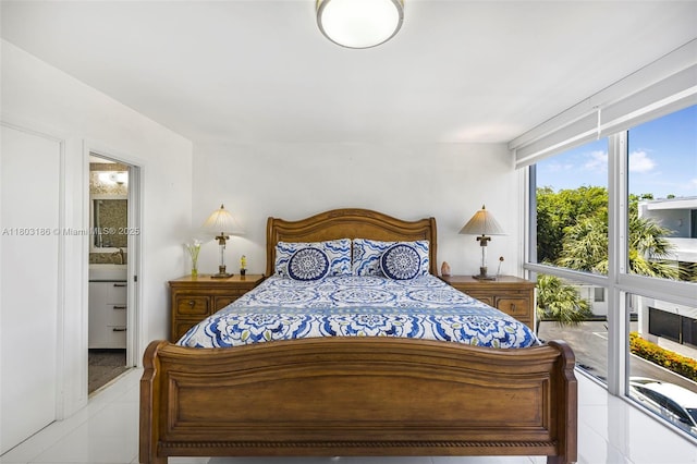 1 Harbour Way Unit 305, Bal Harbour, FL 33154 - bedroom featuring tile patterned floors and ensuite bathroom
