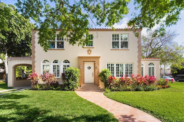 1801 SW 12th St, Miami, FL 33135 - mediterranean / spanish-style house with stucco siding and a front lawn