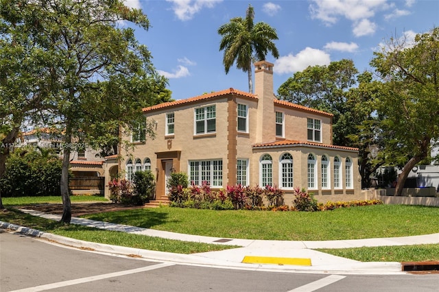 1801 SW 12th St, Miami, FL 33135 - mediterranean / spanish house with a chimney, stucco siding, and a tiled roof